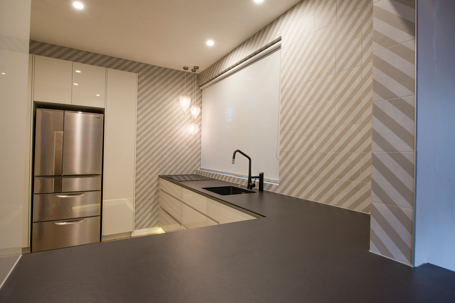 Striped tiles Floor to ceiling tiles Feature tiles in kitchen Kitchen window treatments Kitchen blinds Undermount black sink Modern Melbourne Kitchen Contemporary Kitchen Melbourne lighting Interesting kitchens The kitchen designer
