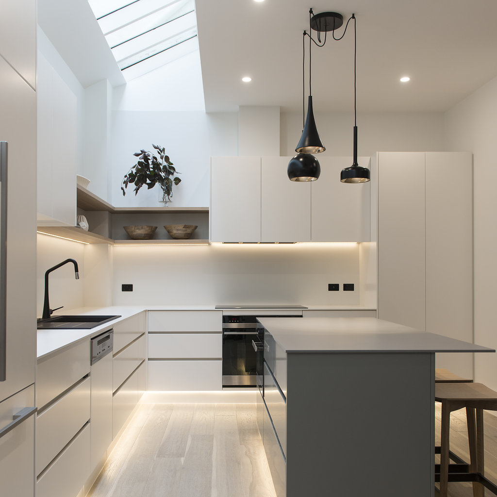 Carlton warehouse renovation Porcelain kitchen Porcelain splashback Interior design Carlton Interior decoration Carlton Residential interiors Carlton 2 pac cupboard Custom lighting Floating shelves Timber shelves Integrated dishwasher Carlton Interior designer Carlton styling Carlton kitchen designer Warehouse living Carlton Dulux Cardrona Winning Appliances Kitchen layout Pendant lighting Natasha Walker Carlton Porters Paints Prahran Dulux paints Snowy mountain paint colour E&S trading Custom joinery Kitchen joinery design