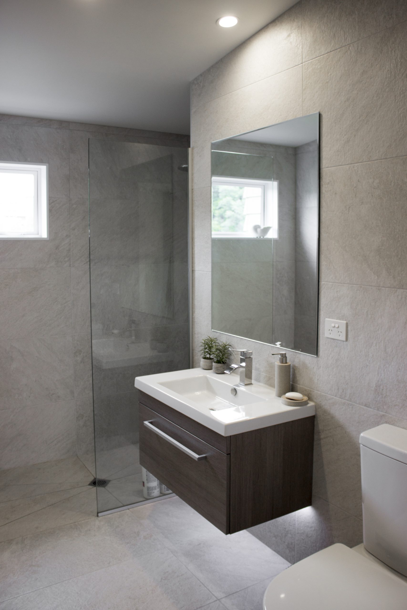 Elegant bathroom design with natural tones at Sorrento Beach House by Natasha Walker Interiors in Melbourne