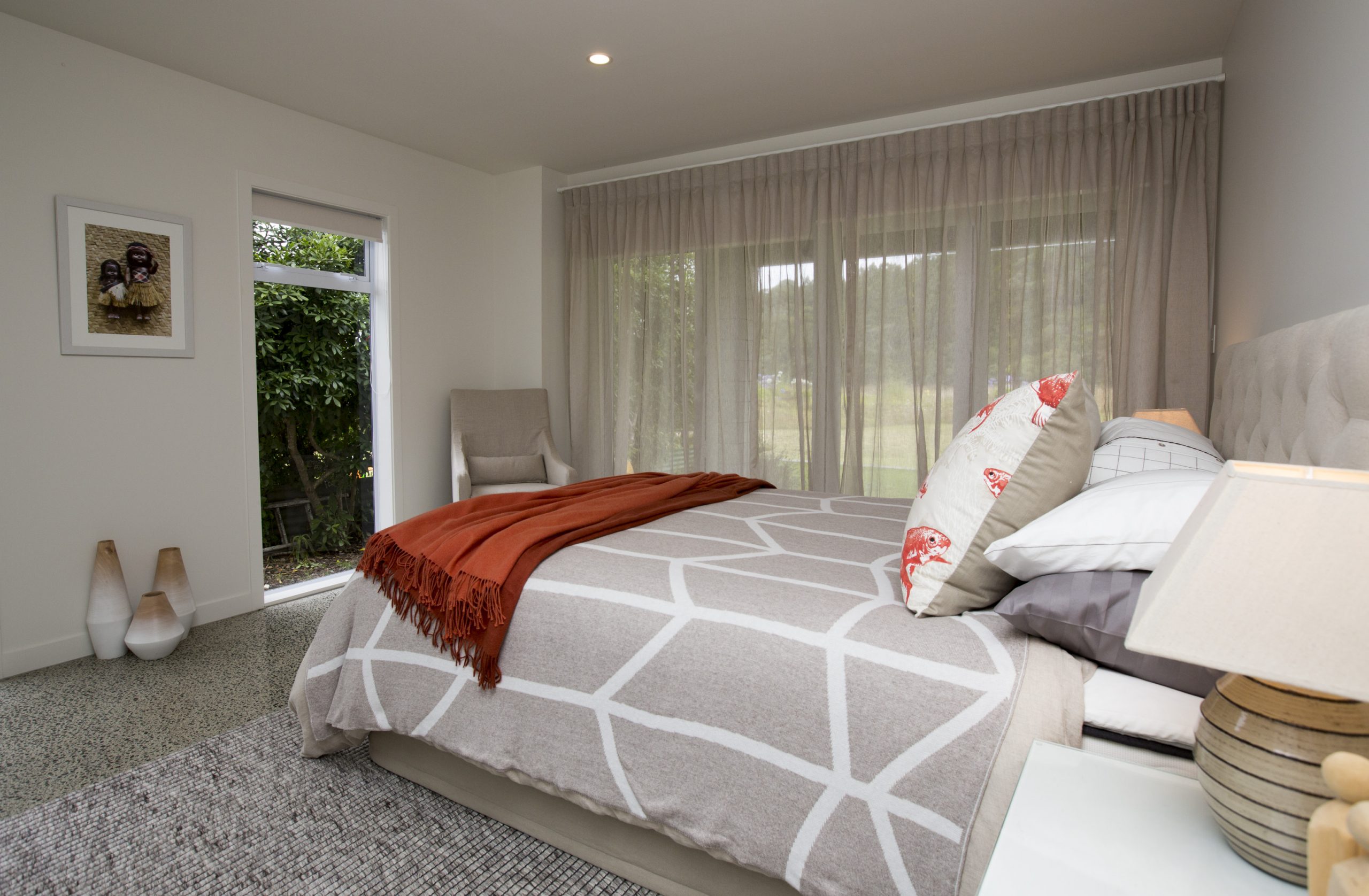 Tranquil bedroom interior with coastal styling by Natasha Walker Interiors at Sorrento Beach House, Melbourne