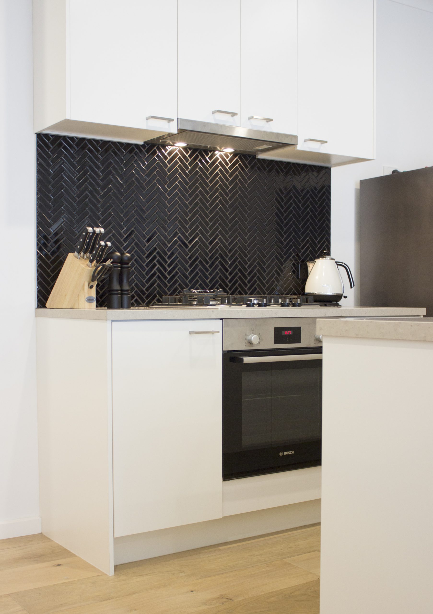 Kitchen makeover Herringbone black tiles